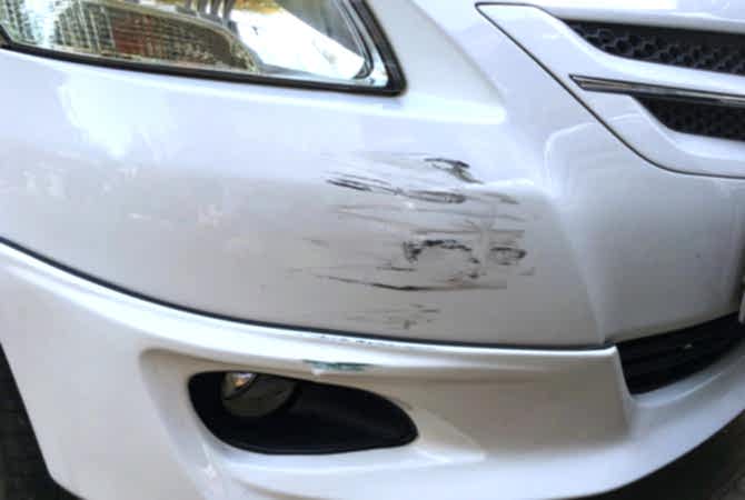 Typical bumper scuff on a car's rear bumper