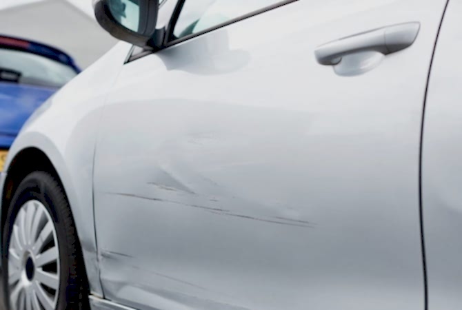 Minor accidental damage on car bumper after repair