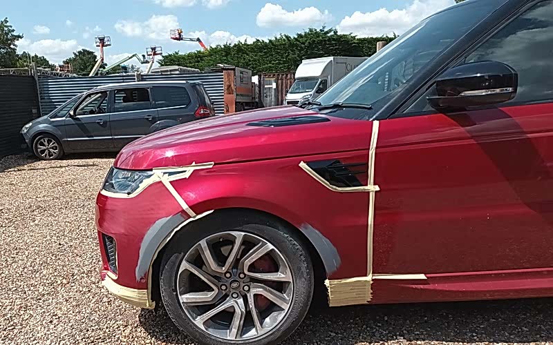 Close-up of Range Rover SPORT scratch removal process